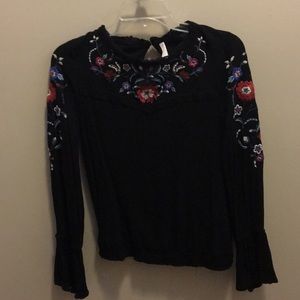 Thin, black long-sleeve shirt